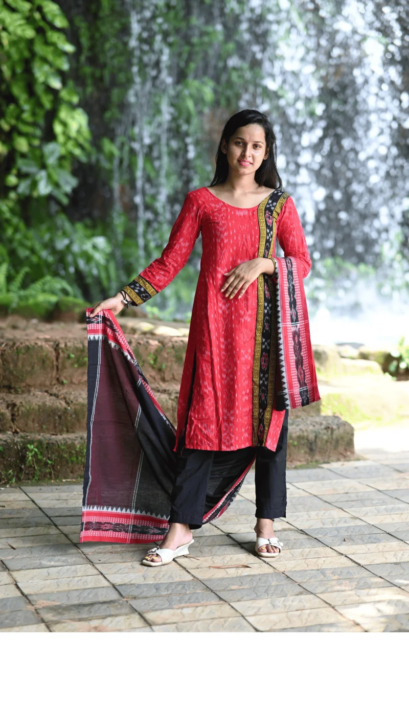 STICHED-Salwar Kameez with Dupatta, styled in a traditional red–black contrast theme with ikat-inspired patterns.