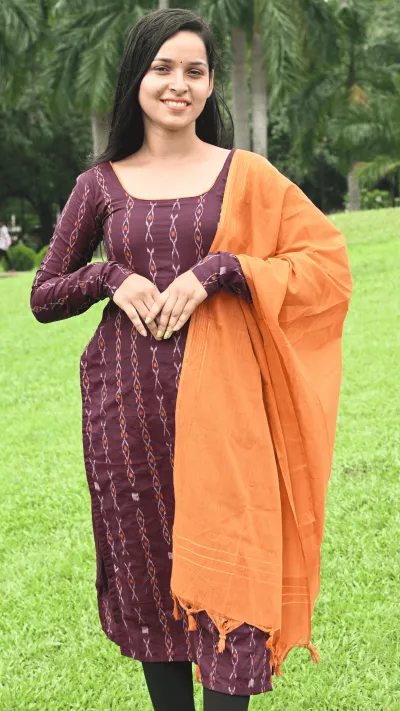 STICHED-SAMBALPURI SUITSETS,maroon–orange contrast combination.
